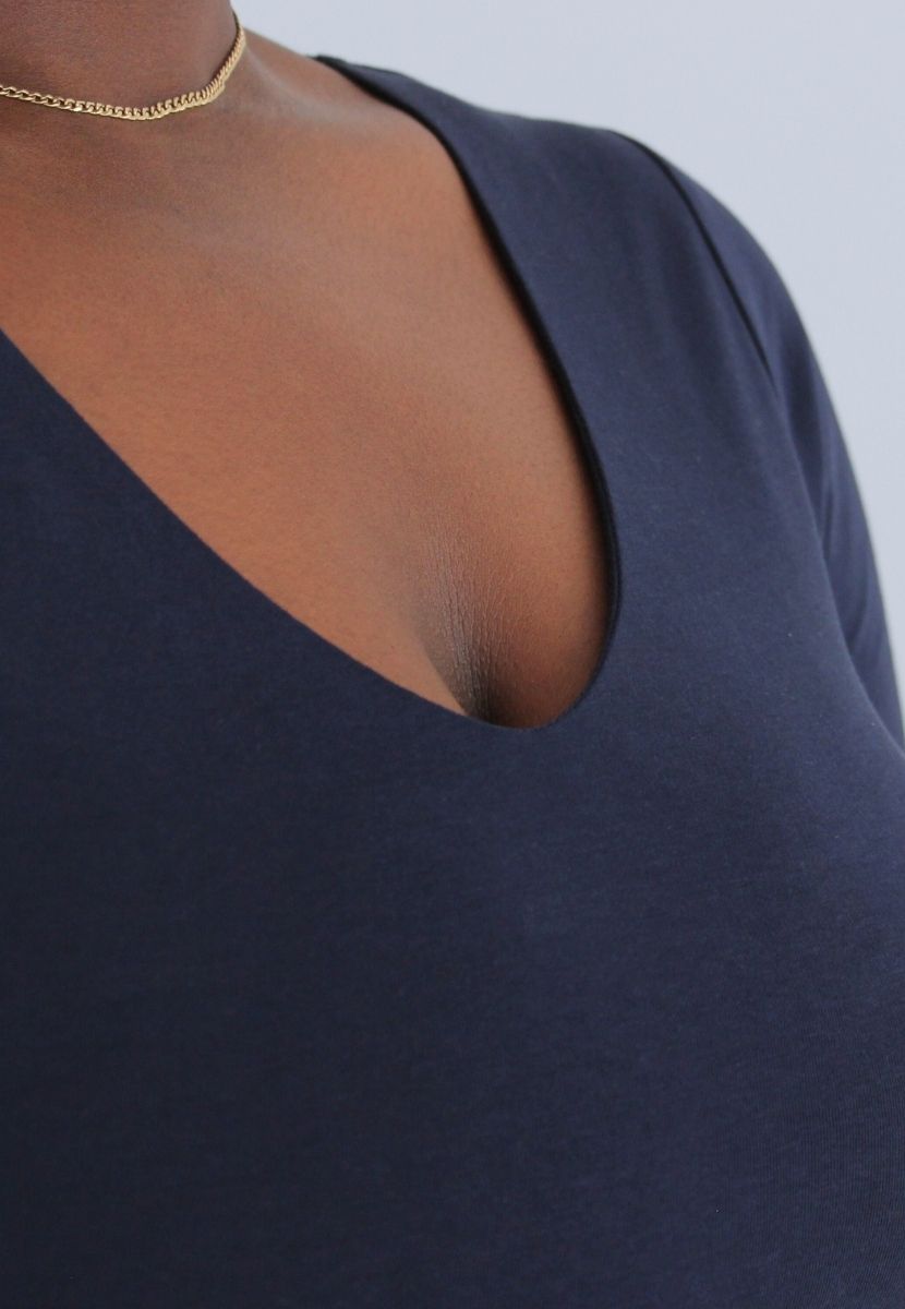 organic cotton v-neck bodysuit close up